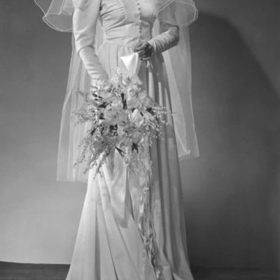 Iconic Elements of 1950s Wedding Dress Design Photo