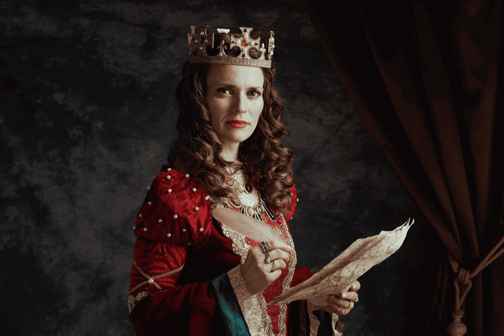 medieval queen in red dress with parchment and crown on dark gray background.