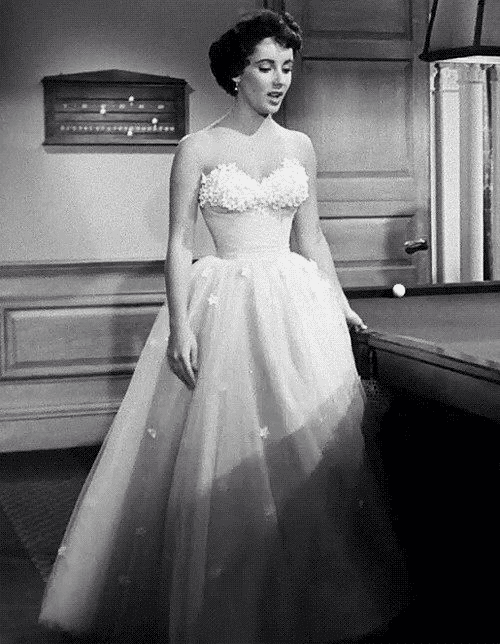 Iconic Elements of 1950s Wedding Dress Design Photo