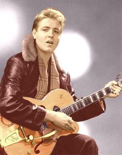 Eddie Cochran with a quitar.