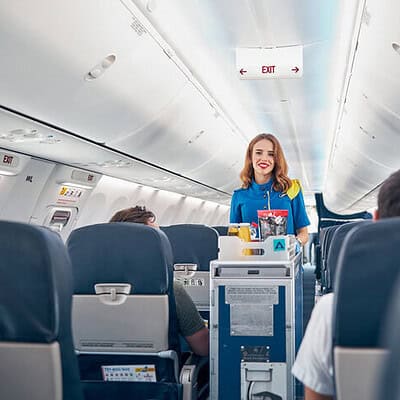 Flight Attendants in 2025 vs 1950's Stewardesses Photo